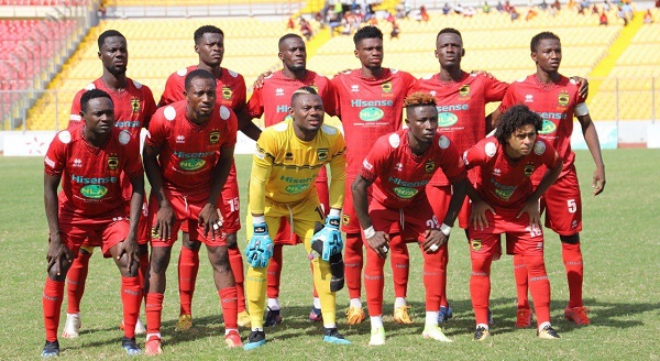 Players of Kumasi Asante Kotoko pose for the camera prior to their match against Aduana at the Baba Yara Stadium